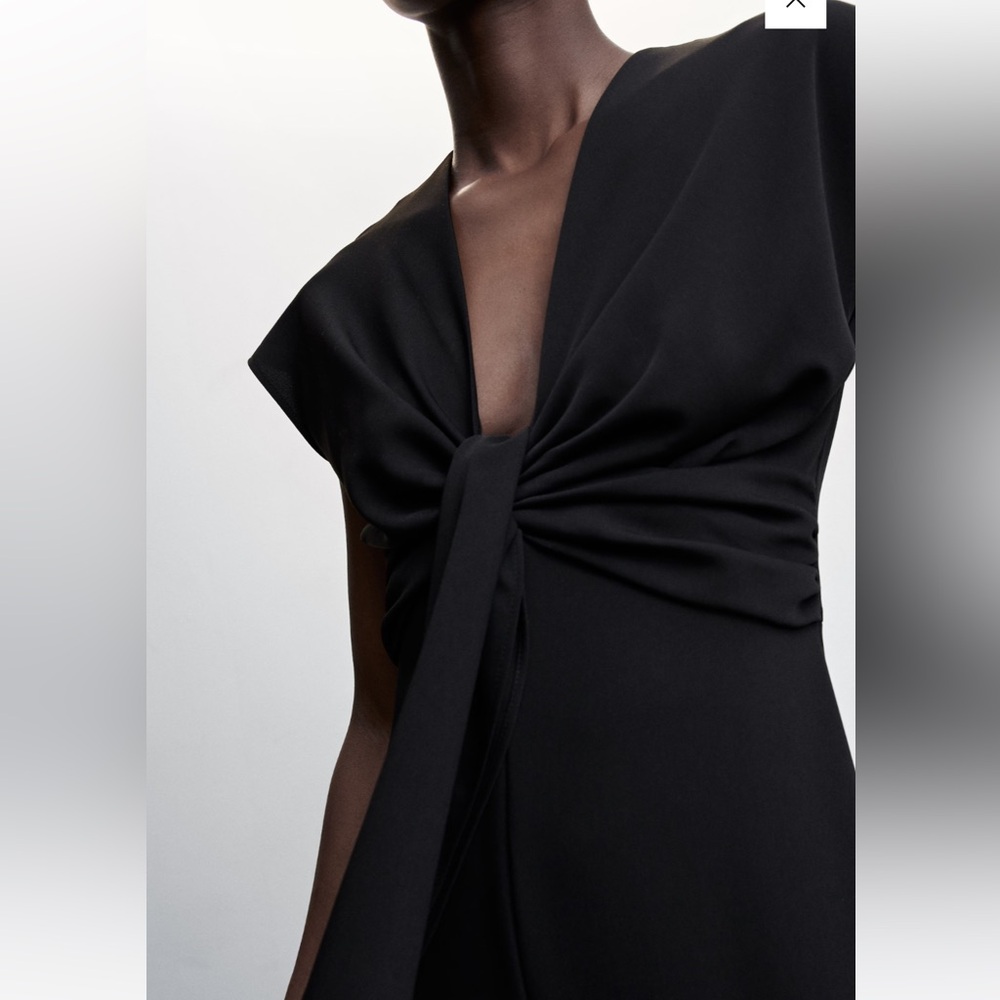 Brand new with tag black jumpsuit, great for work or dressed up night out!